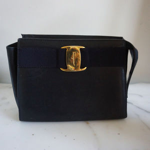 Ferragamo cluch, small